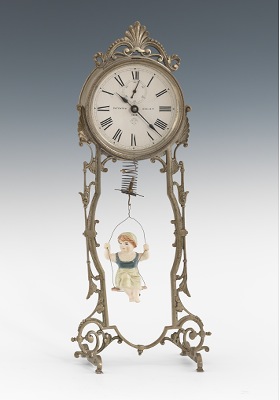 An Ansonia 1886 Bouncing Doll Clock