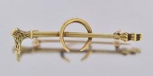 An Antique 14k Riding Crop Bro
