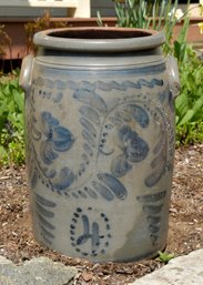 An antique 4 gallon stoneware crock