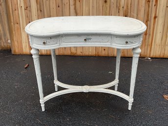 An antique Adams style kidney