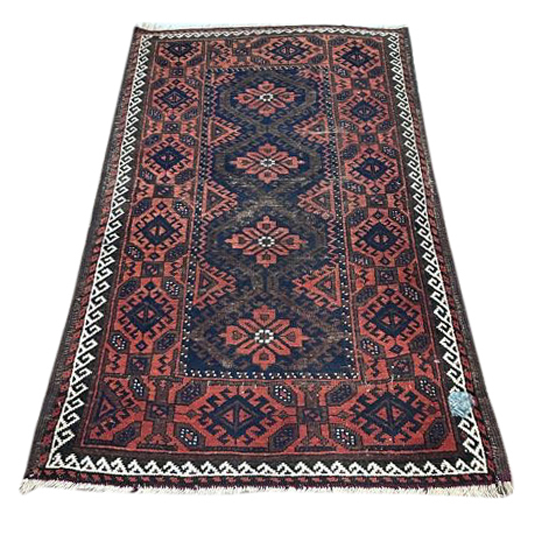 AN ANTIQUE AFGHAN CARPET An antique