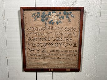 An antique American school sampler,