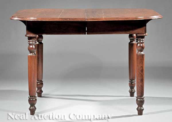 An Antique American Walnut Dining