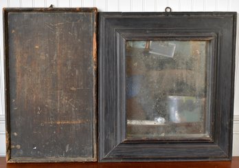 An antique black painted wood