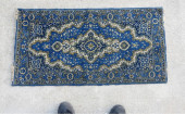 AN ANTIQUE BLUE WOOL SERAPI OR