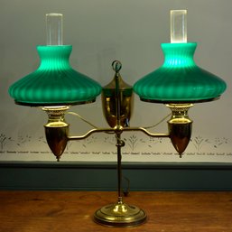 An antique brass double student