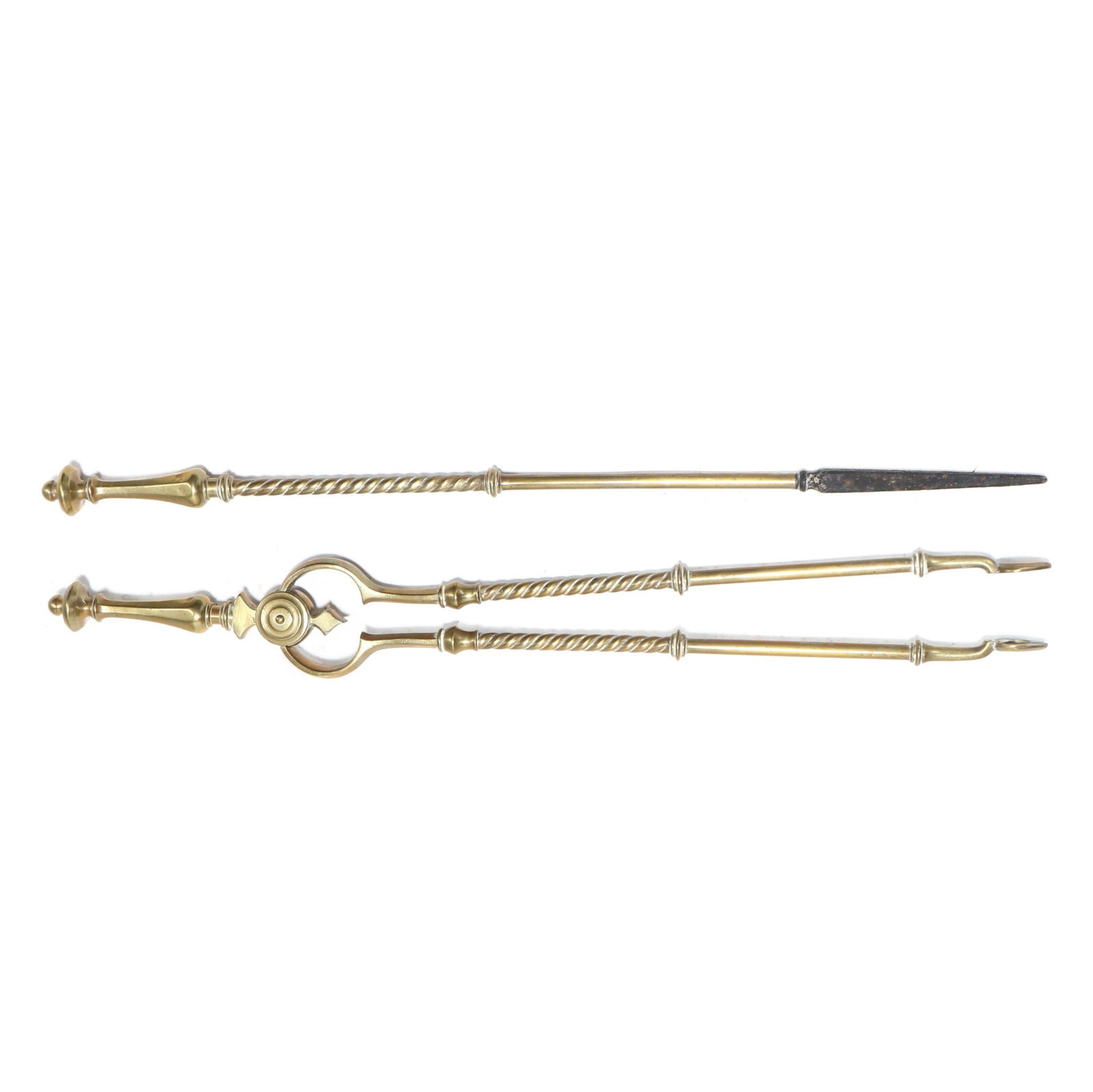 AN ANTIQUE BRASS FIREPLACE TONG AND