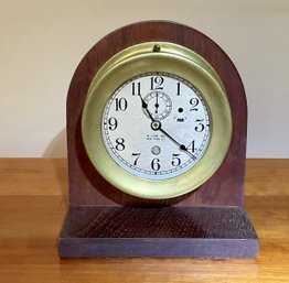 An antique brass ships clock