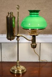 An antique brass single branch