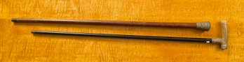 An antique cane with sterling