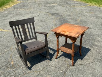An antique carved oak rocking chair