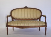 AN ANTIQUE CARVED & UPHOLSTERE