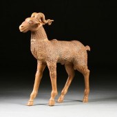 AN ANTIQUE CARVED WOOD GOAT SC