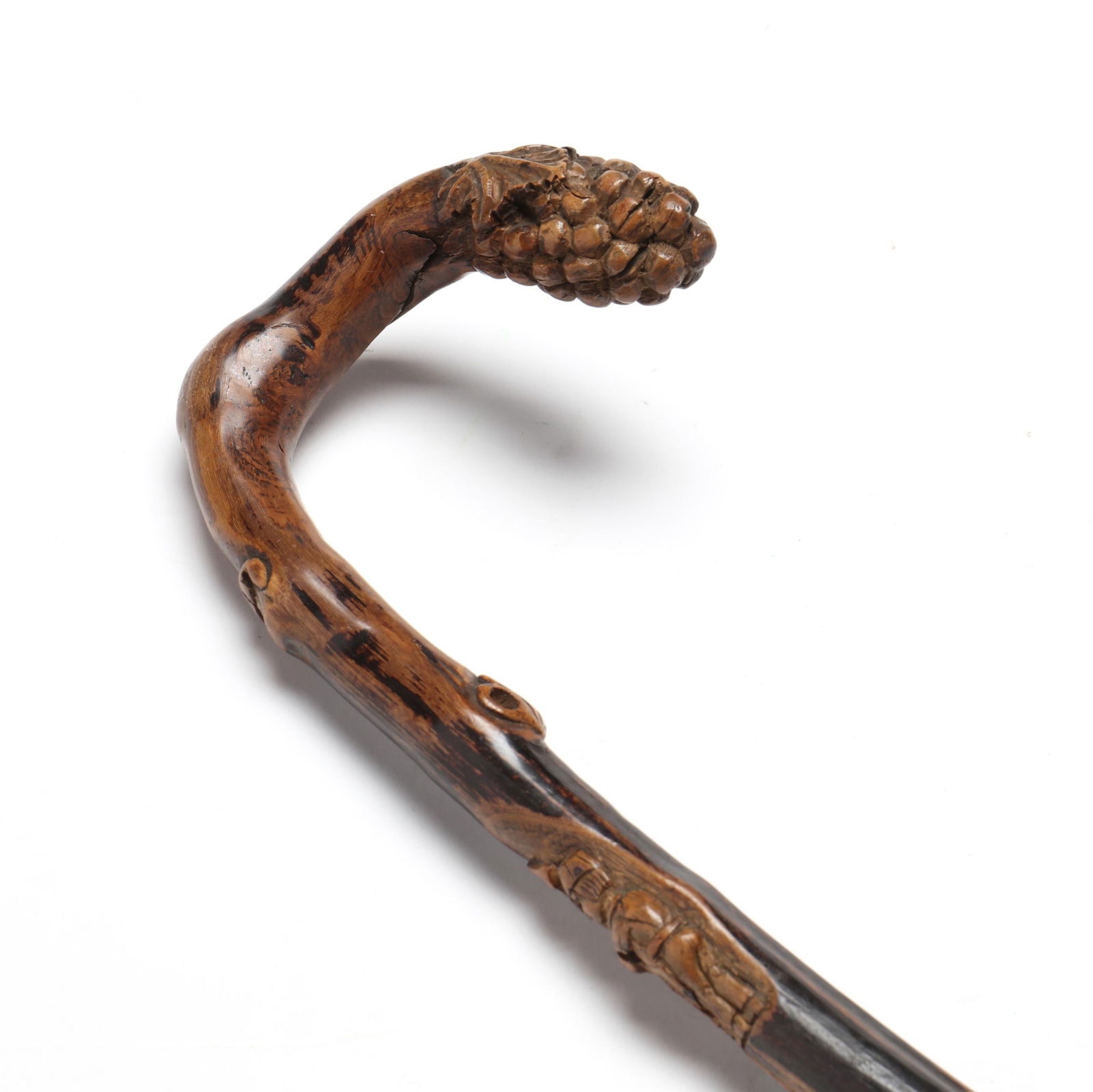 AN ANTIQUE CARVED WOOD WINE MAKER'S