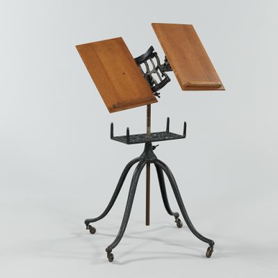 An Antique Cast Iron and Oak