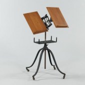 An Antique Cast Iron and Oak D
