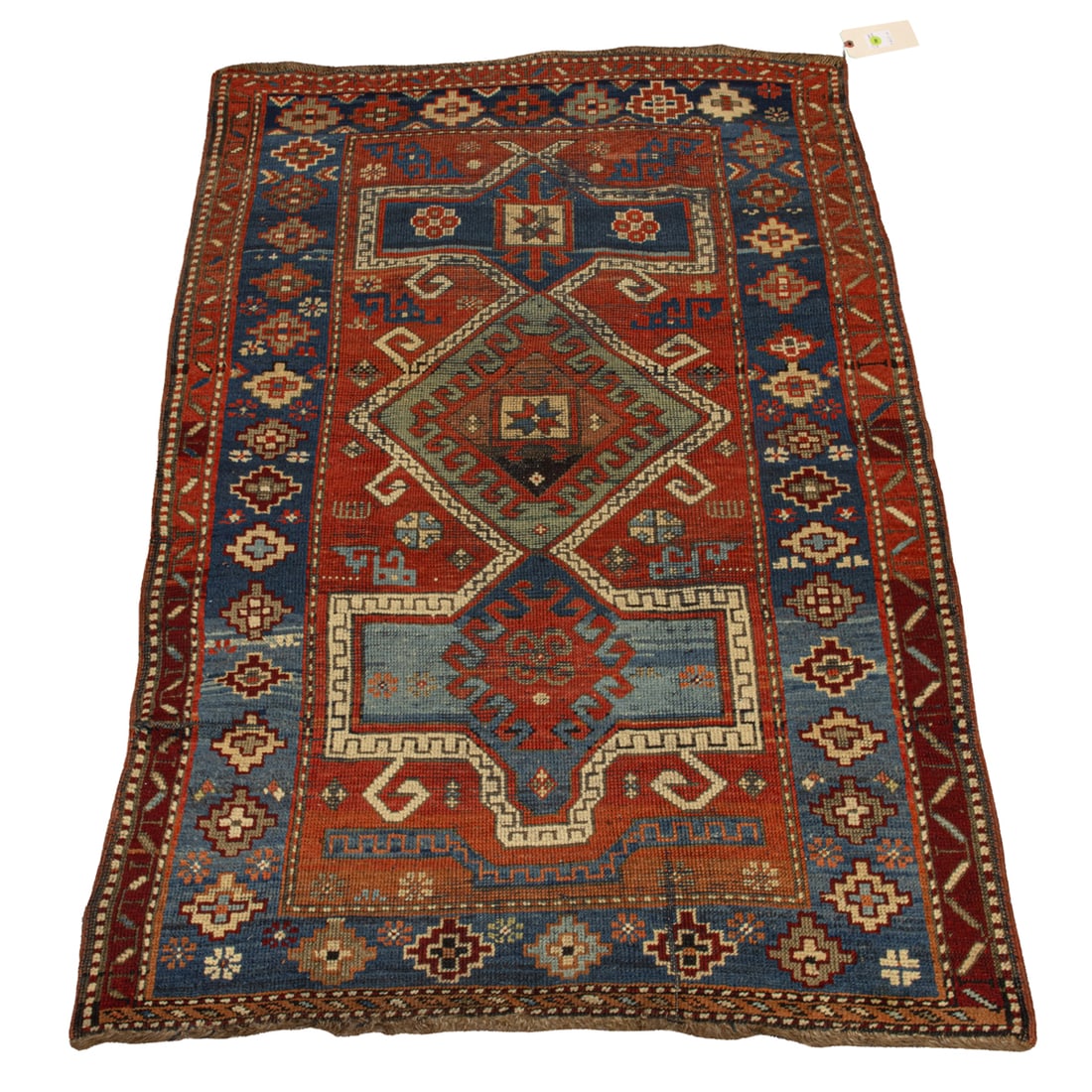 AN ANTIQUE CAUCASIAN KAZAK RUNNERAn