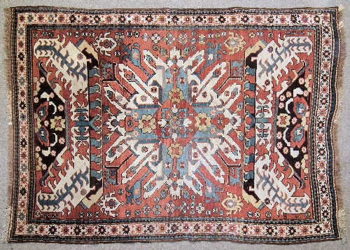 An Antique Caucasian rug woven in