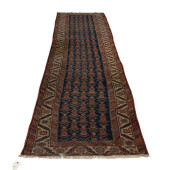 AN ANTIQUE CAUCASIAN RUNNER, 3