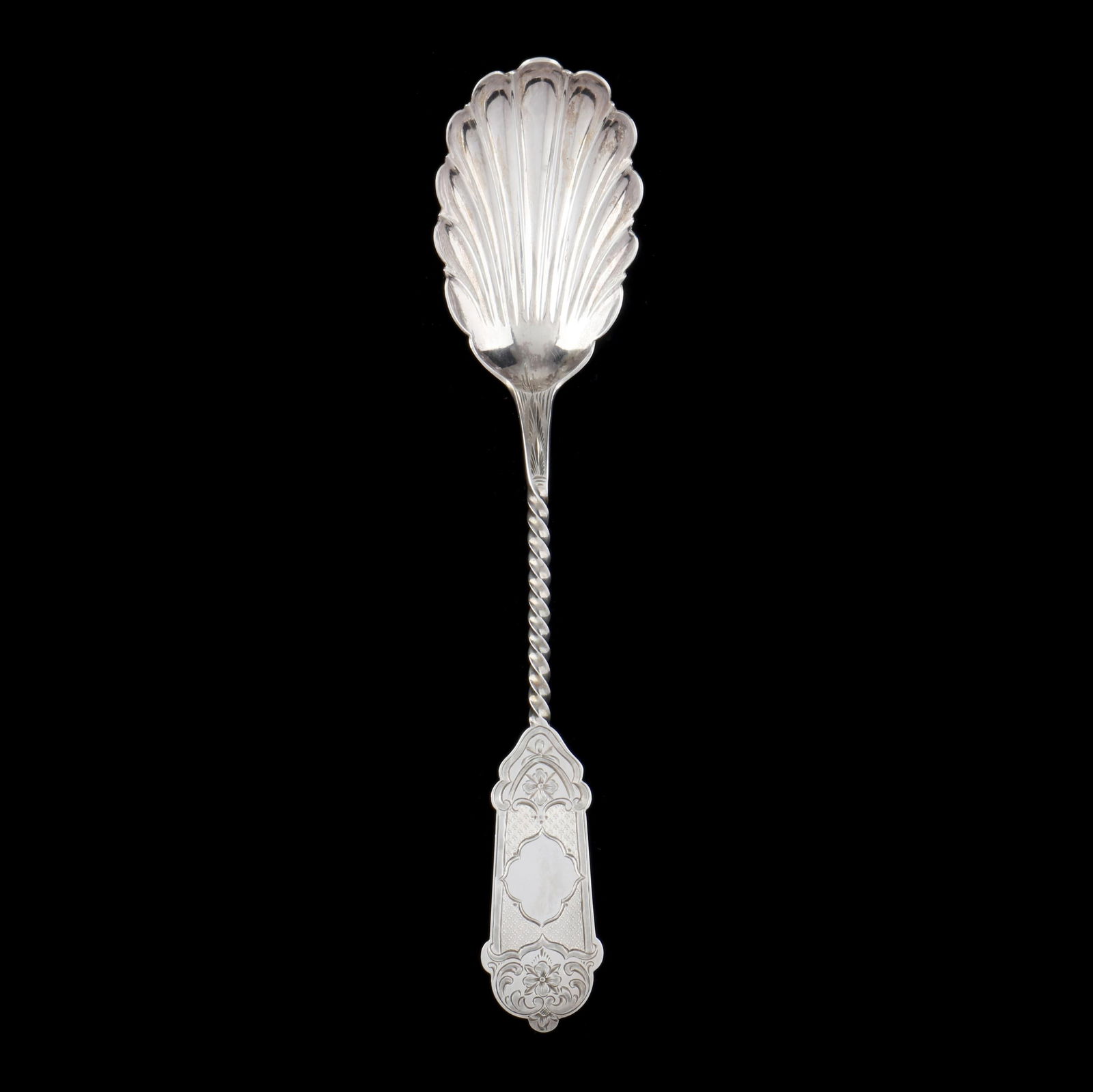 AN ANTIQUE COIN SILVER CASE SHELL
