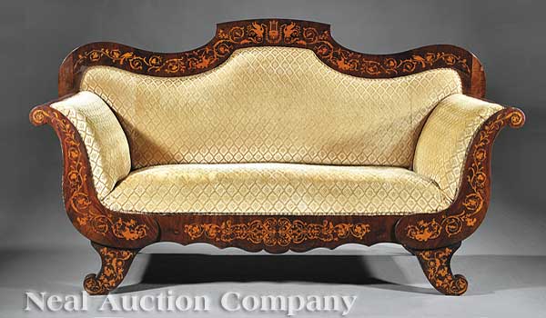 An Antique Continental Mahogany and
