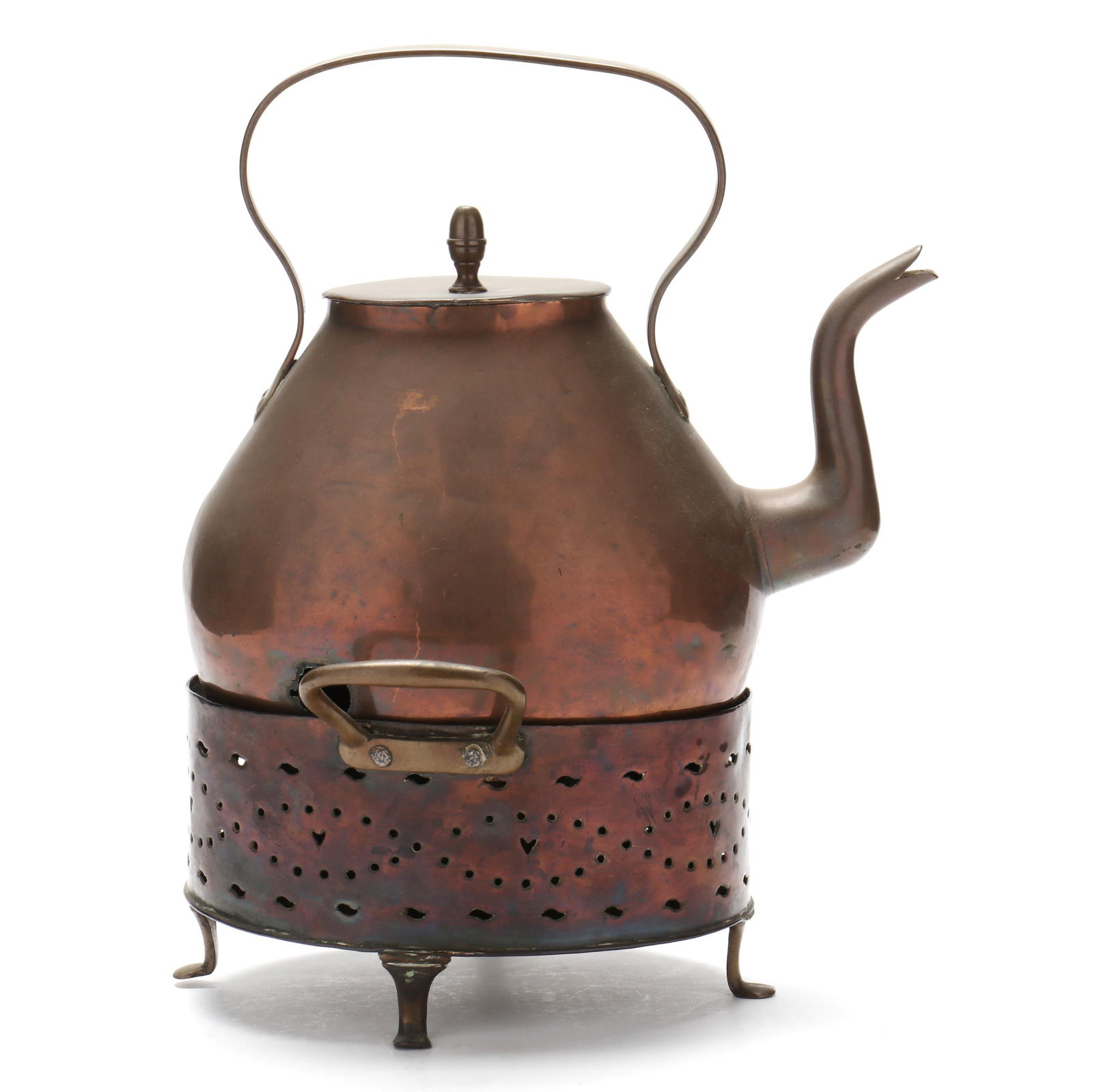AN ANTIQUE COPPER KETTLE ON STANDAn