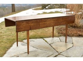 An antique country drop leaf