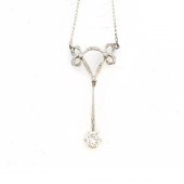 AN ANTIQUE DIAMOND AND PLATINU