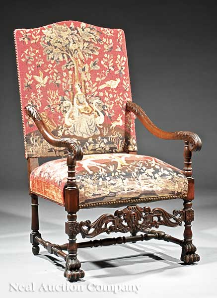 An Antique English Carved Walnut