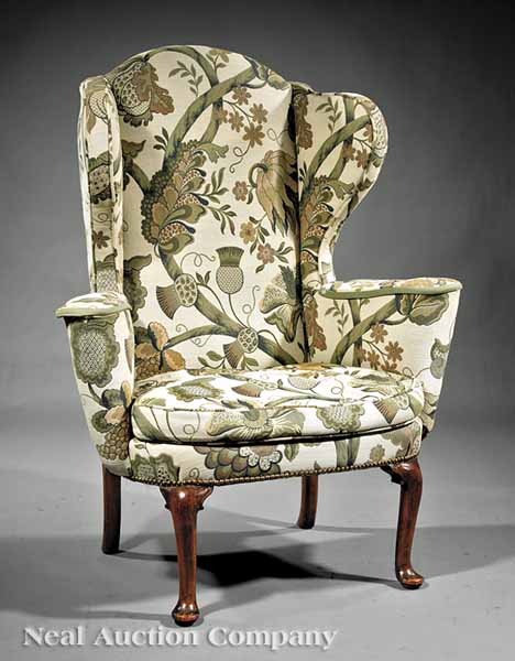 An Antique English Wing Chair