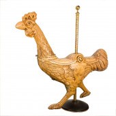 AN ANTIQUE ENGLISH WOOD CAROUS