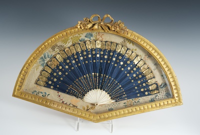 An Antique Fan Framed in a Shaped