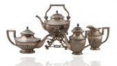 AN ANTIQUE FOUR PIECE SILVER S