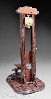An Antique French Carved Walnu