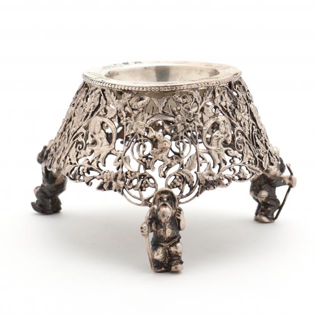 AN ANTIQUE HANAU SILVER FIGURAL