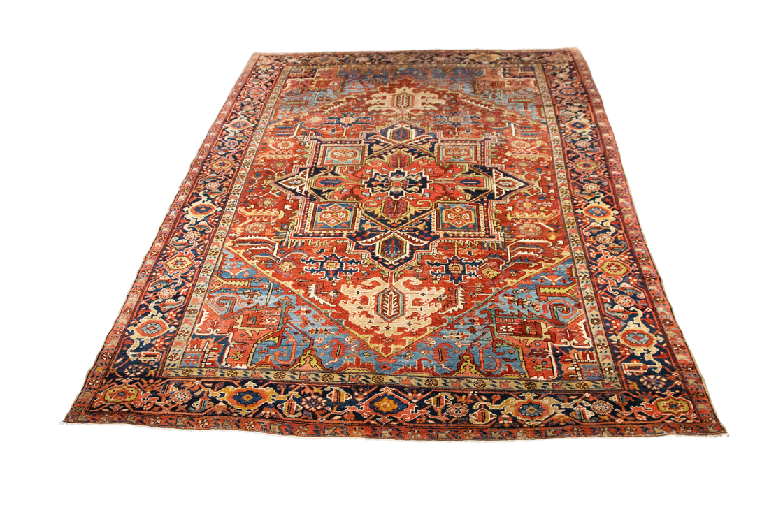 AN ANTIQUE HERIZ CARPET An