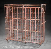 An Antique Iron Wine Rack earl