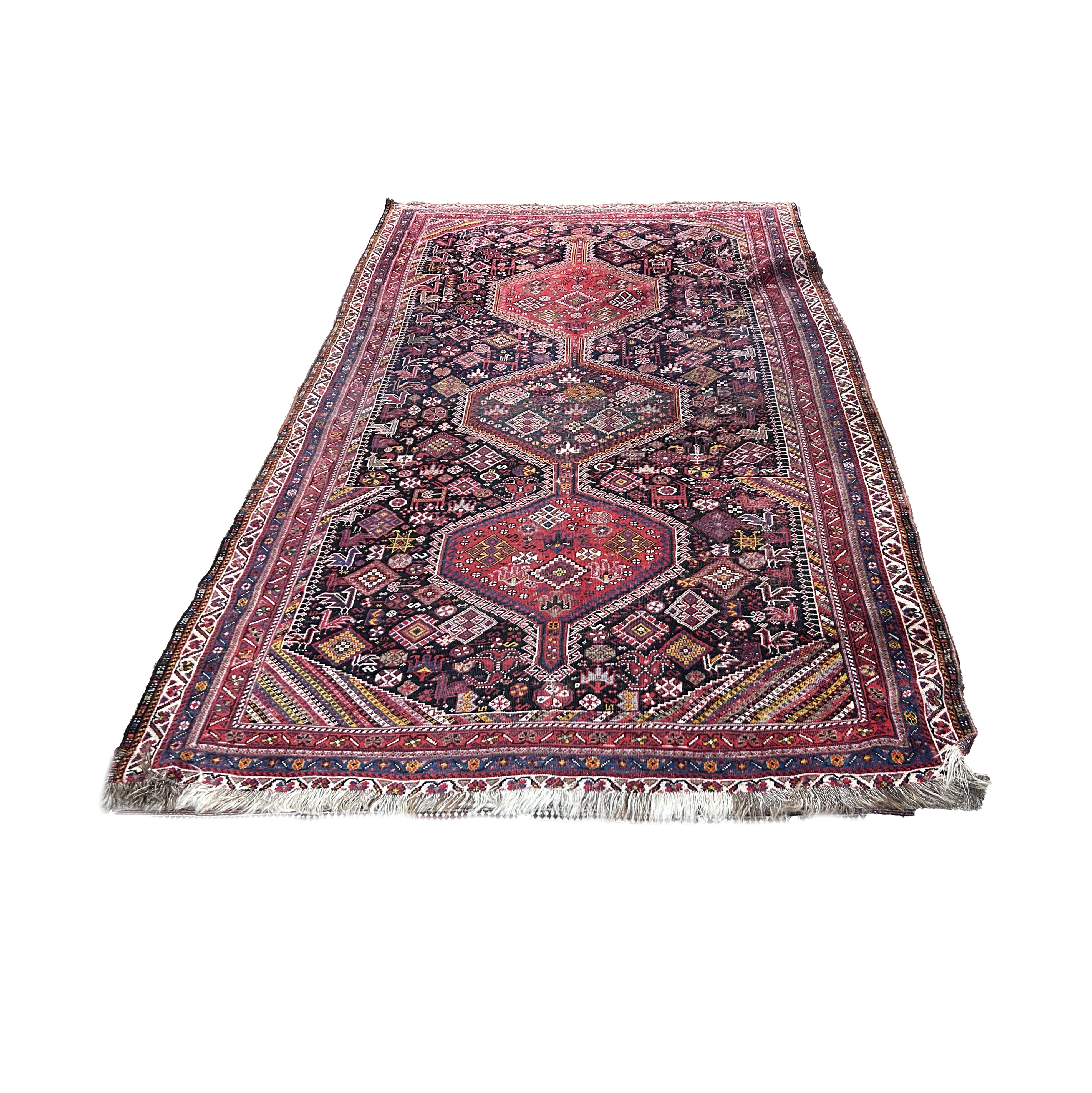 AN ANTIQUE KURDISH CARPET An