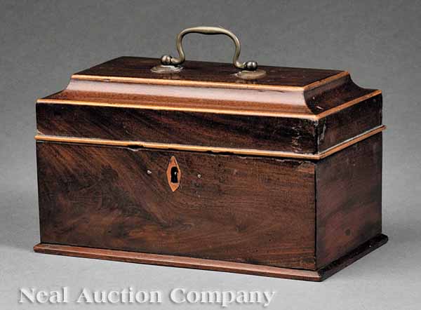 An Antique Mahogany Tea Caddy