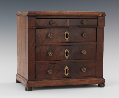An Antique Miniature Chest of
