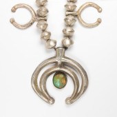 AN ANTIQUE NAVAJO BLOSSOM NAJA