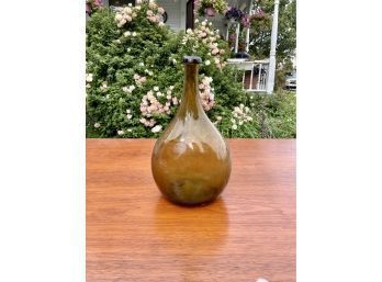 An antique non symmetrical glass