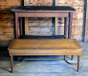 An antique oak library table with a