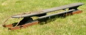 An antique painted wood traver