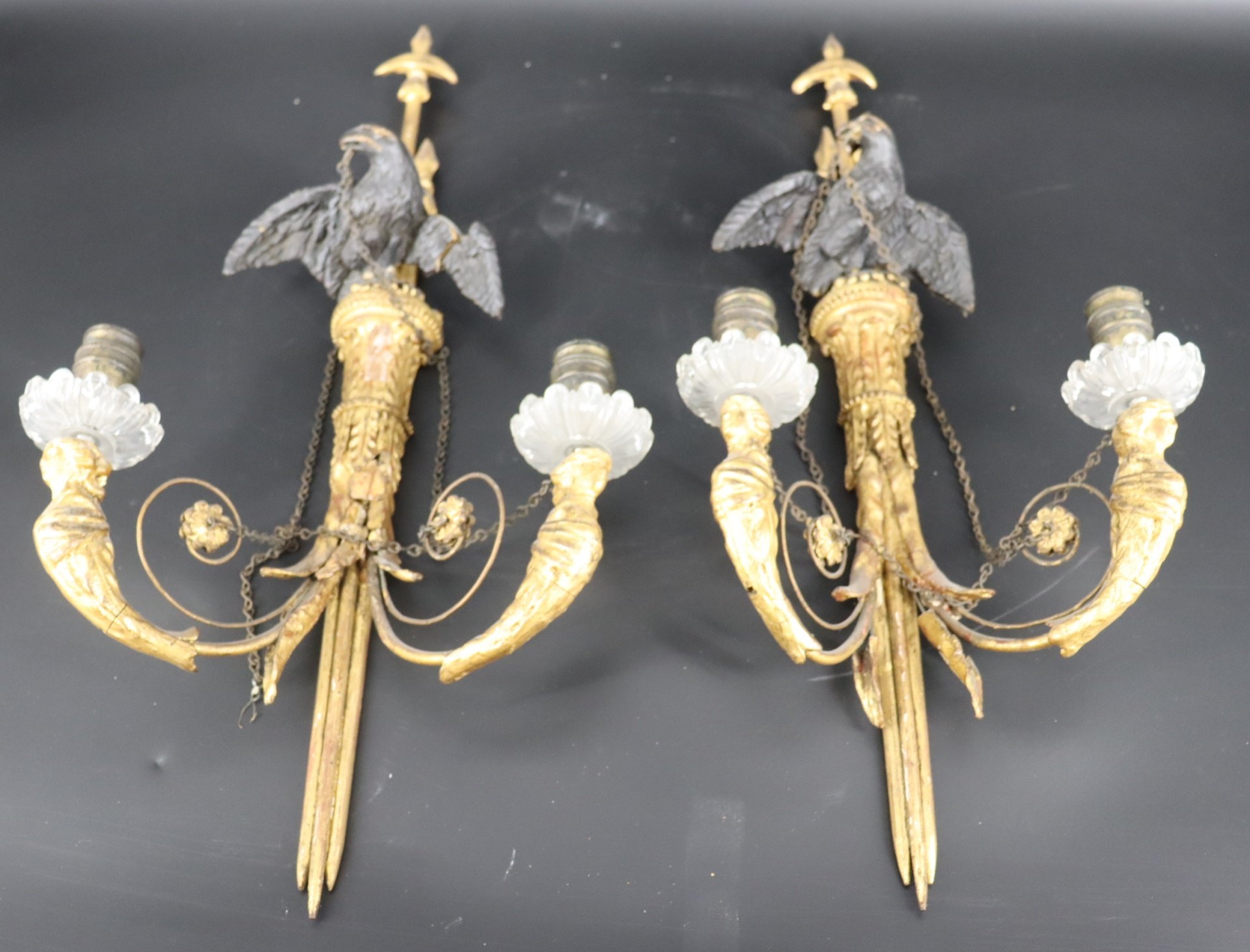AN ANTIQUE PAIR OF CARVED