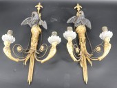 AN ANTIQUE PAIR OF CARVED GILT