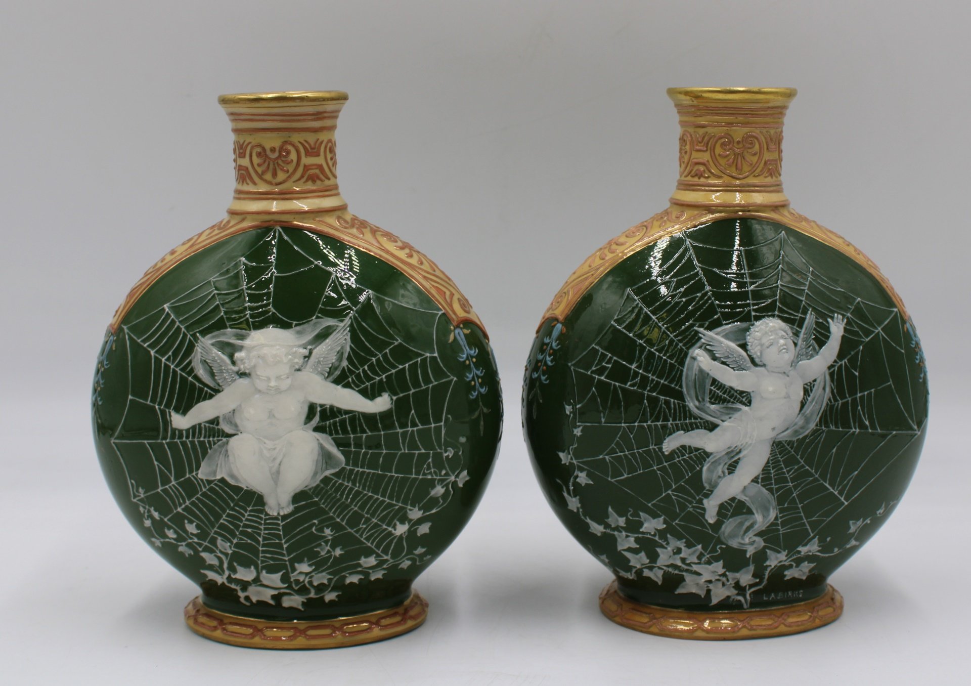AN ANTIQUE PAIR OF PATE SUR PATE