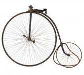AN ANTIQUE PENNY-FARTHING BICY