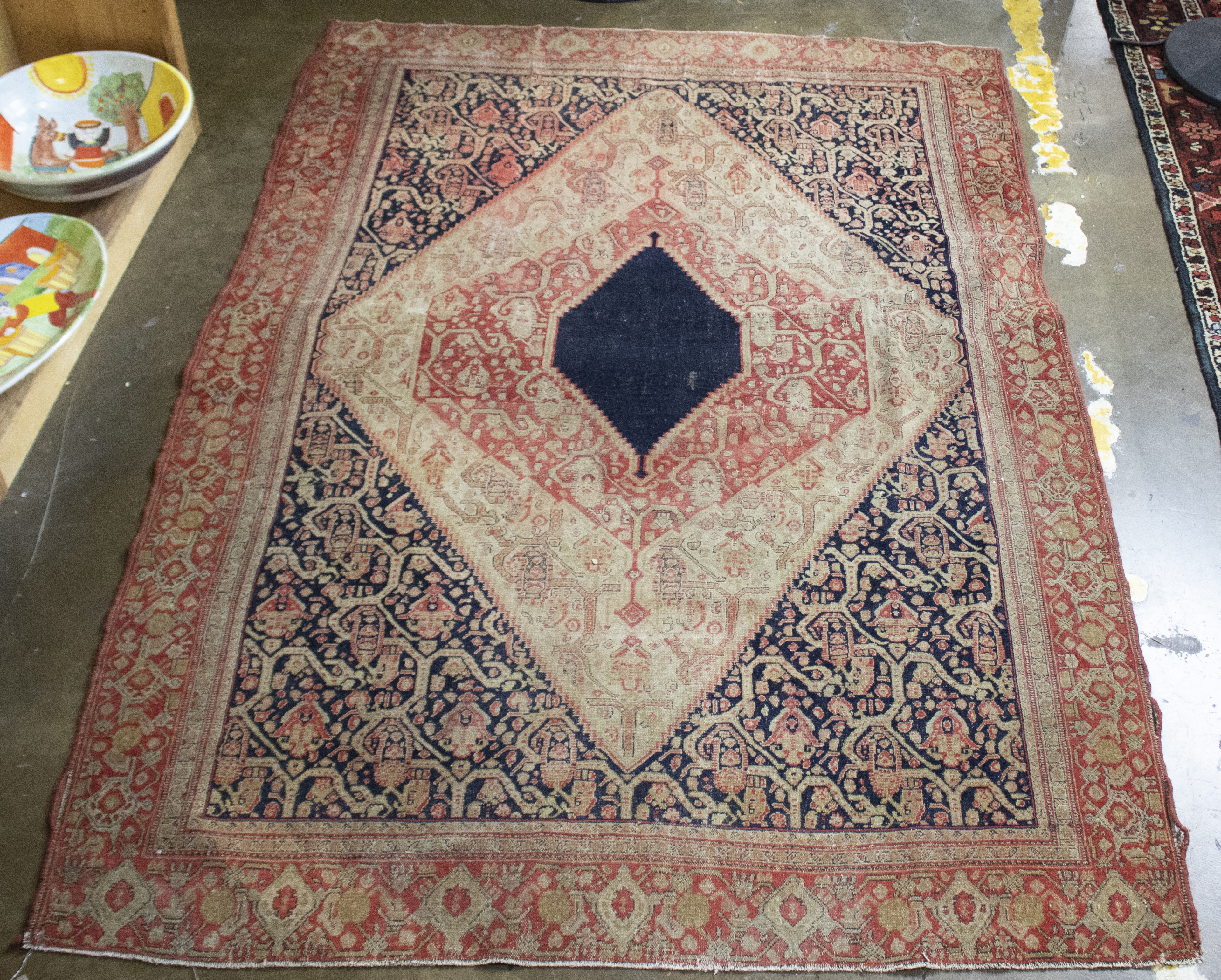 AN ANTIQUE PERSIAN MALAYER CARPET