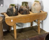 AN ANTIQUE PINE OLIVE OIL STAN